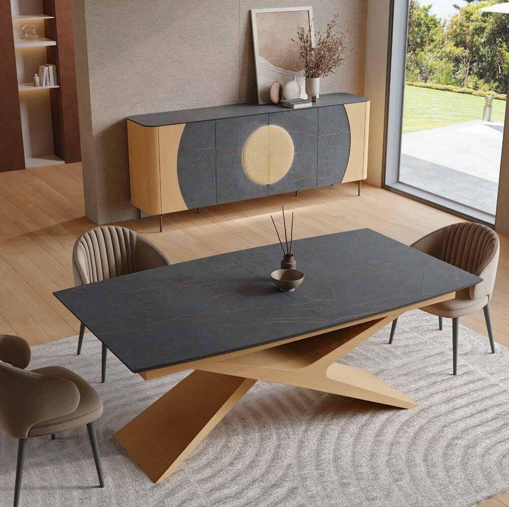 Table à manger extensible plateau céramique et piètement sculptural en bois 