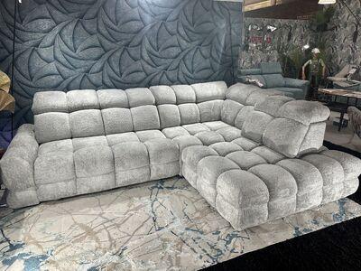 Grand canapé cocooning avec grande assise coulissante électrique