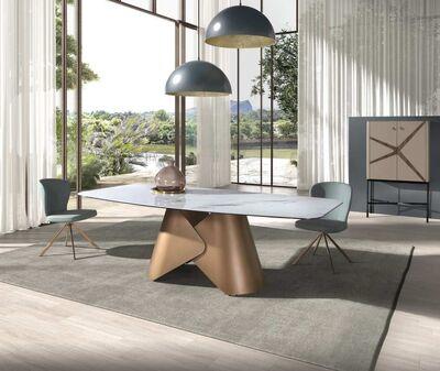 Table de repas plateau tonneau effet marbre blanc pied design en bronze